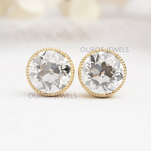 front view of old european cut diamond milgrain bezel stud earrings yellow gold