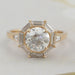 top view of old european round cut tapered baguette diamond halo engagement ring