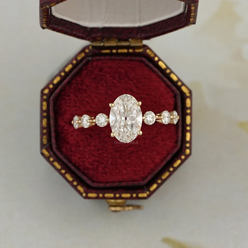 old mine moval cut lab diamond solitaire accent engagement ring in jewelry box