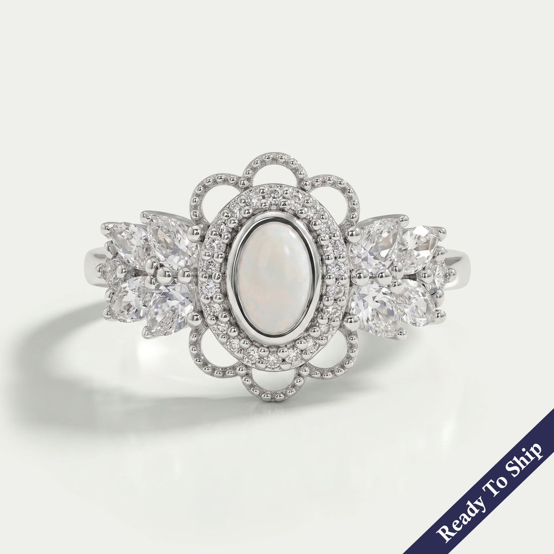Opal Oval Cut And Halo Diamond Floral Engagement Ring