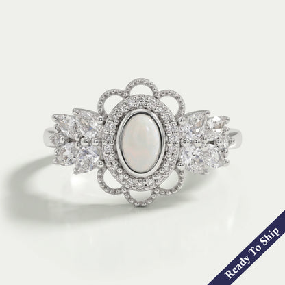Opal Oval Cut And Halo Diamond Floral Engagement Ring