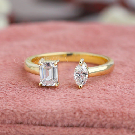 front view of emerald and marquise-cut lab diamond open cuff wedding band