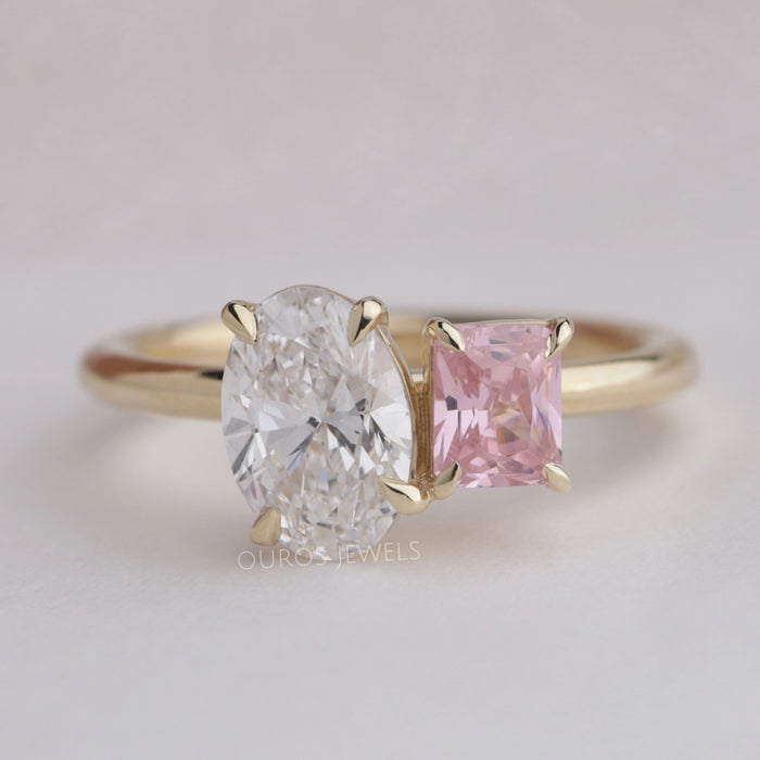 front view of radiant cut gemstone and oval diamond toi et moi engagement ring