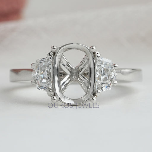 front view of oval-shaped half-moon-cut lab diamond semi-mount wedding ring