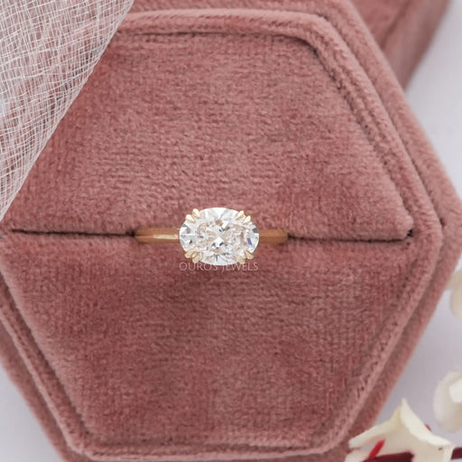 oval cut east west solitaire diamond ring