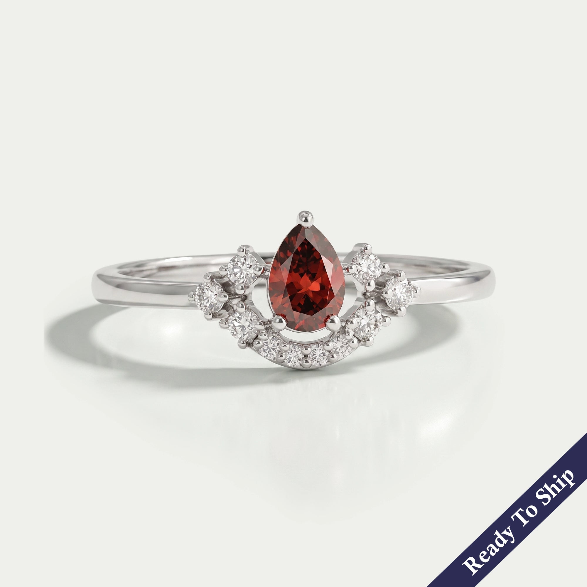 Red Pear Diamond Curved Halo Ring