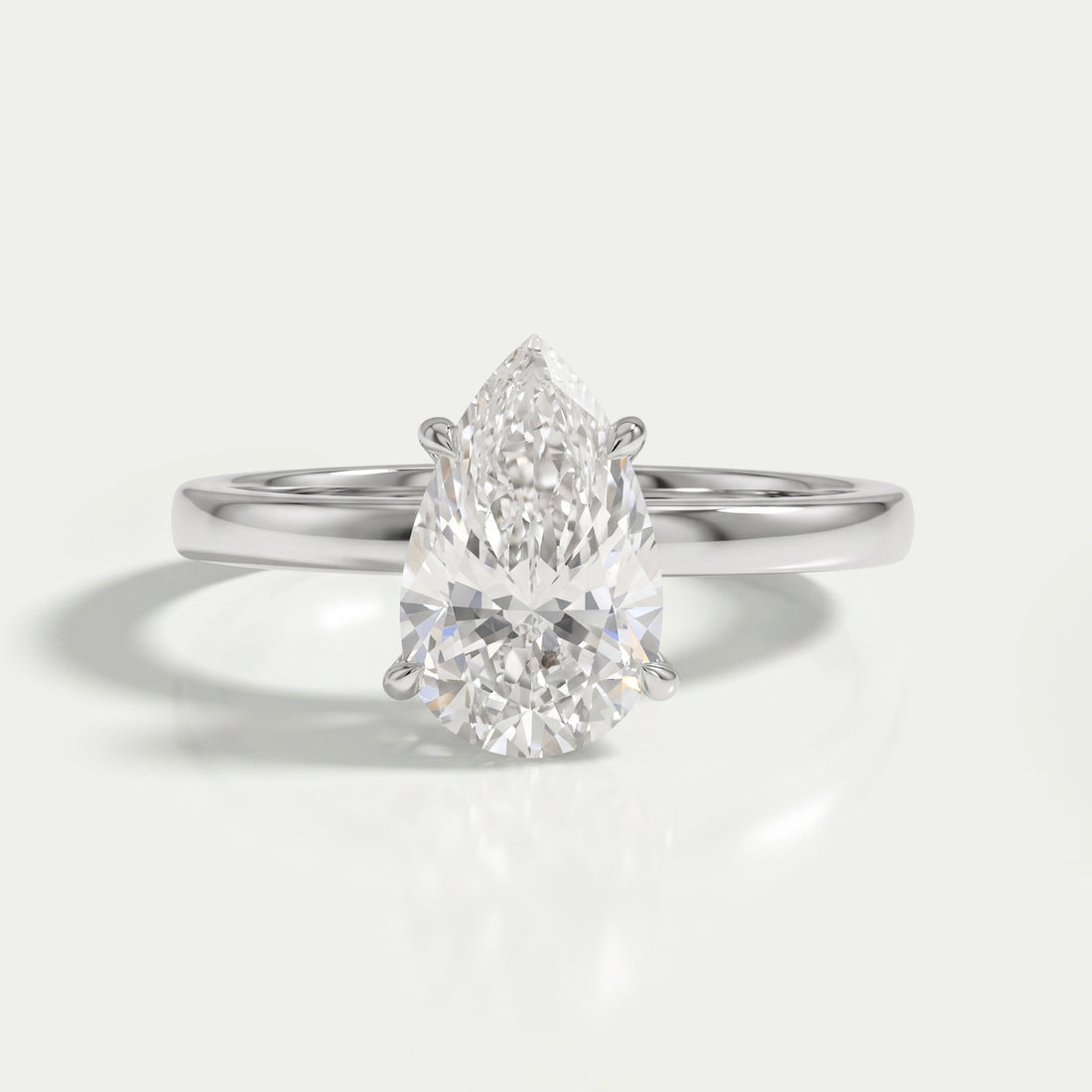 Pear Cut Diamond Solitaire Engagement Ring Rings