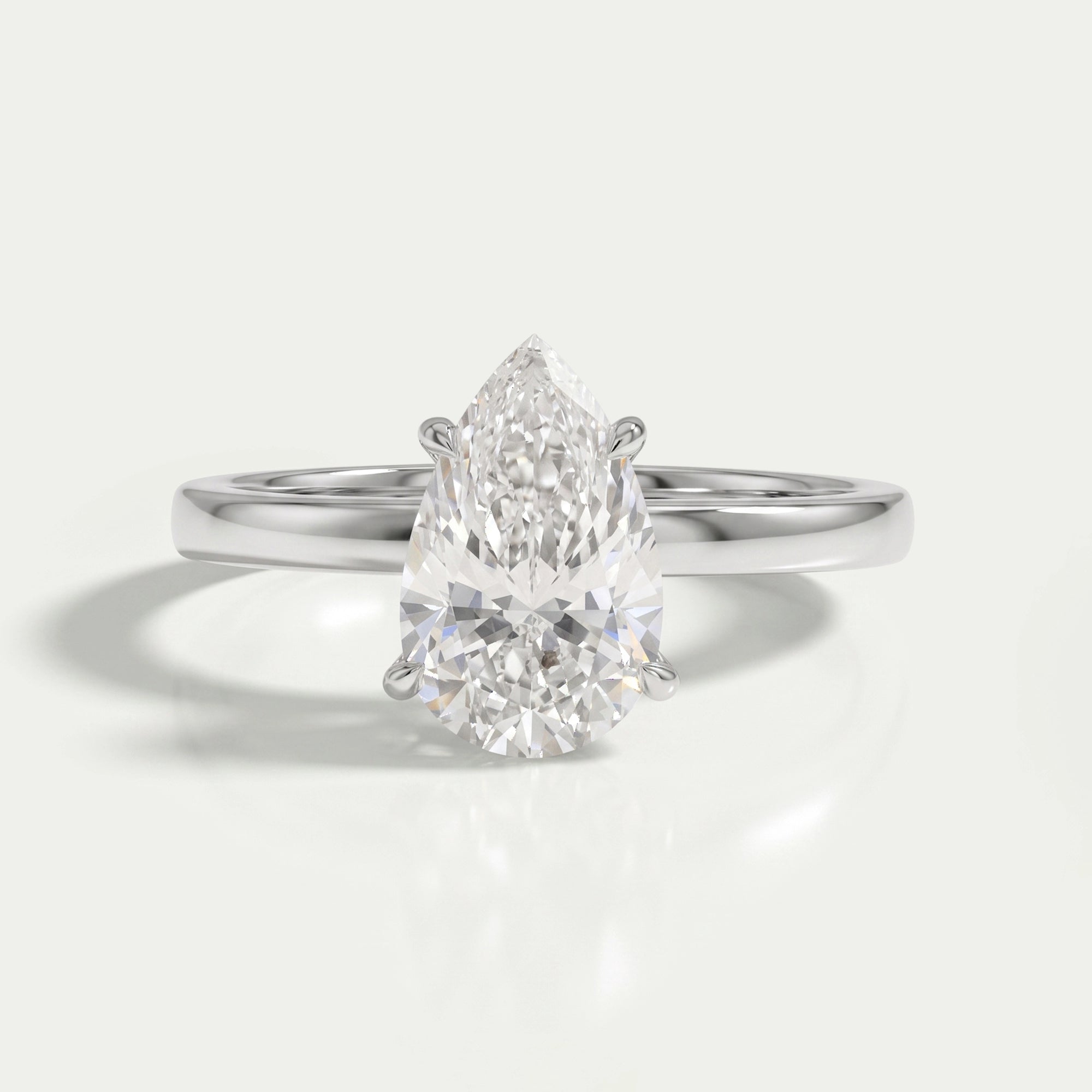 Pear Cut Diamond Solitaire Engagement Ring Rings