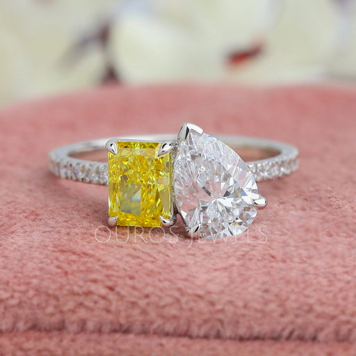 front view of pear and yellow radiant-cut lab diamond toi et moi wedding ring