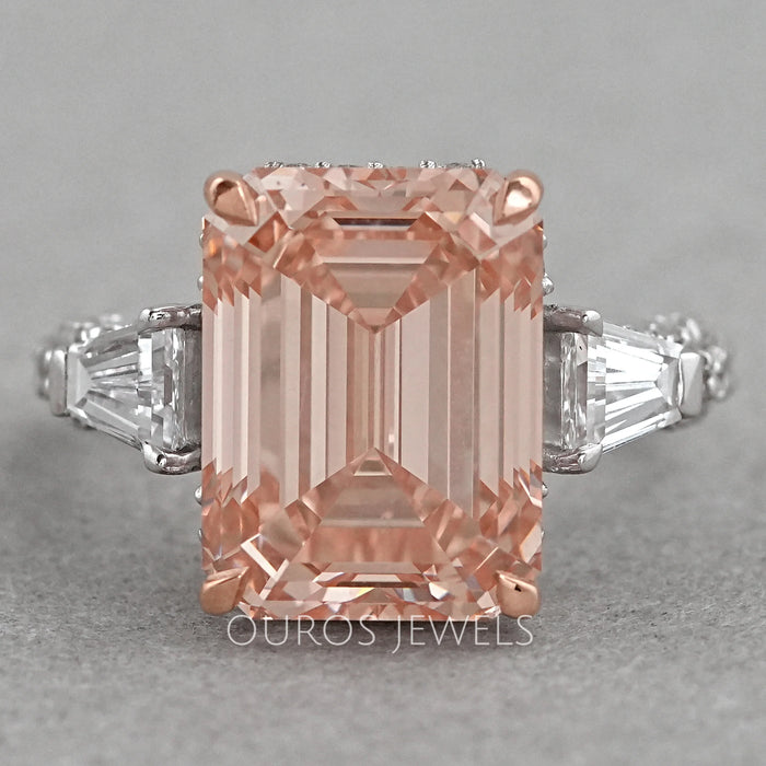 front view of pink emerald diamond three-stone hidden halo colored engagement ring