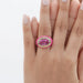 east-west oval lab diamond pink topaz enamel cocktail ring on model's finger