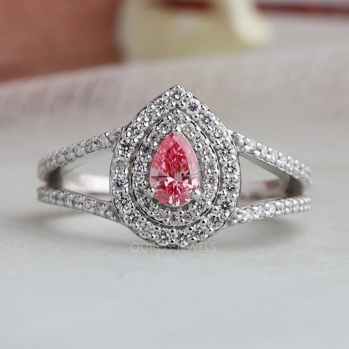 front view of pink pear cut diamond split double halo engagement ring