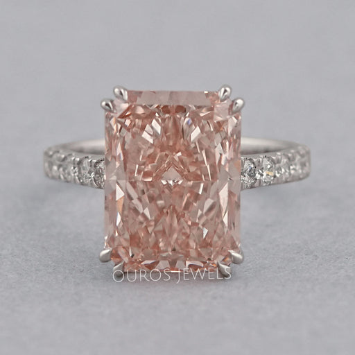 front view of pink radiant-cut diamond double-prong solitaire accent engagement ring