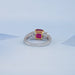 close view of pink ruby cushion cut gemstone solitaire split-shank wedding ring
