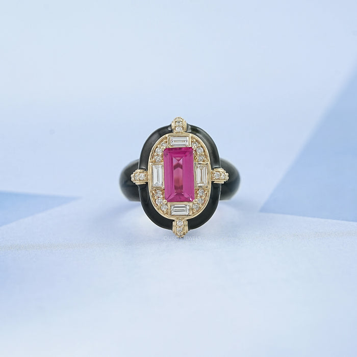 front view of pink baguette-cut lab diamond enamel halo cocktail ring