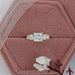 princess cut diamond five stone engagement ring in yellow gold band is in jewelry box