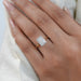 2.50 carat radiant cut diamond hidden halo wedding ring in finger