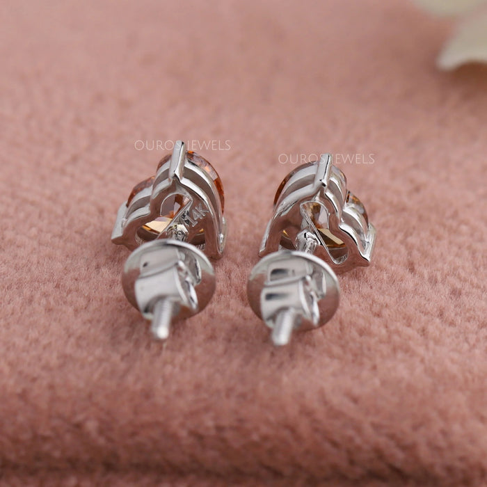 Heart Cut Diamond Solitaire Stud Earrings In Red