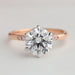 front view of rose-cut round diamond solitaire accent ring with rose gold band