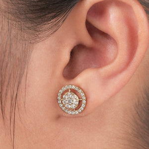 Round Brilliant Cut Diamond Halo Stud Earrings displayed on an ear, highlighting their intricate and sparkling design.