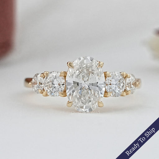 front view of oval and round cut lab diamond five stone engagement ring