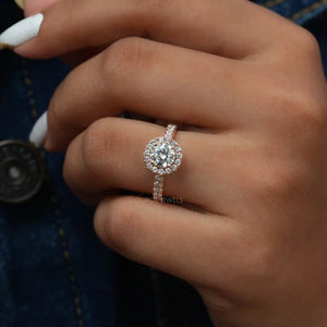 [a women wearing a halo round diamond ring]-[Ouros Jewels]