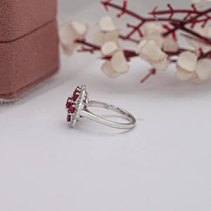 ruby cushion engagement ring with halo of lab grown diamond