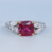 front view of pink ruby cushion cut gemstone solitaire split-shank wedding ring