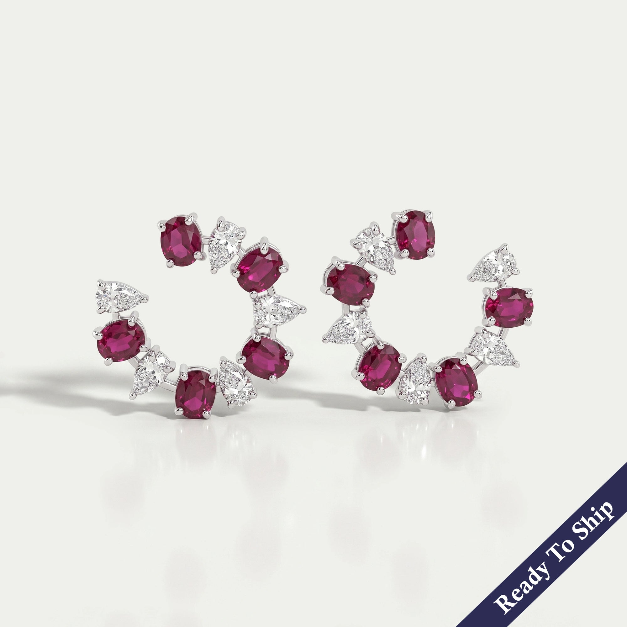 Ruby Oval And Pear Diamond Earrings