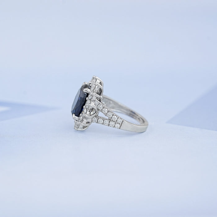 sapphire oval cut gemstone halo split shank engagement ring's left side view