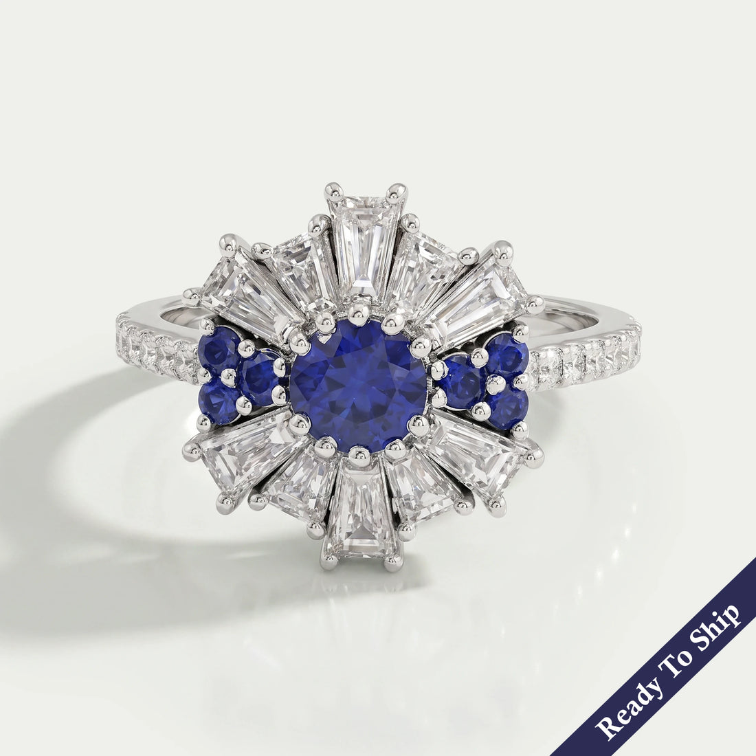 Sapphire Round And Tapered Baguette Diamond Cluster Ring