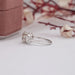 cushion cut three stone engagement ring in old mine cut diamond 