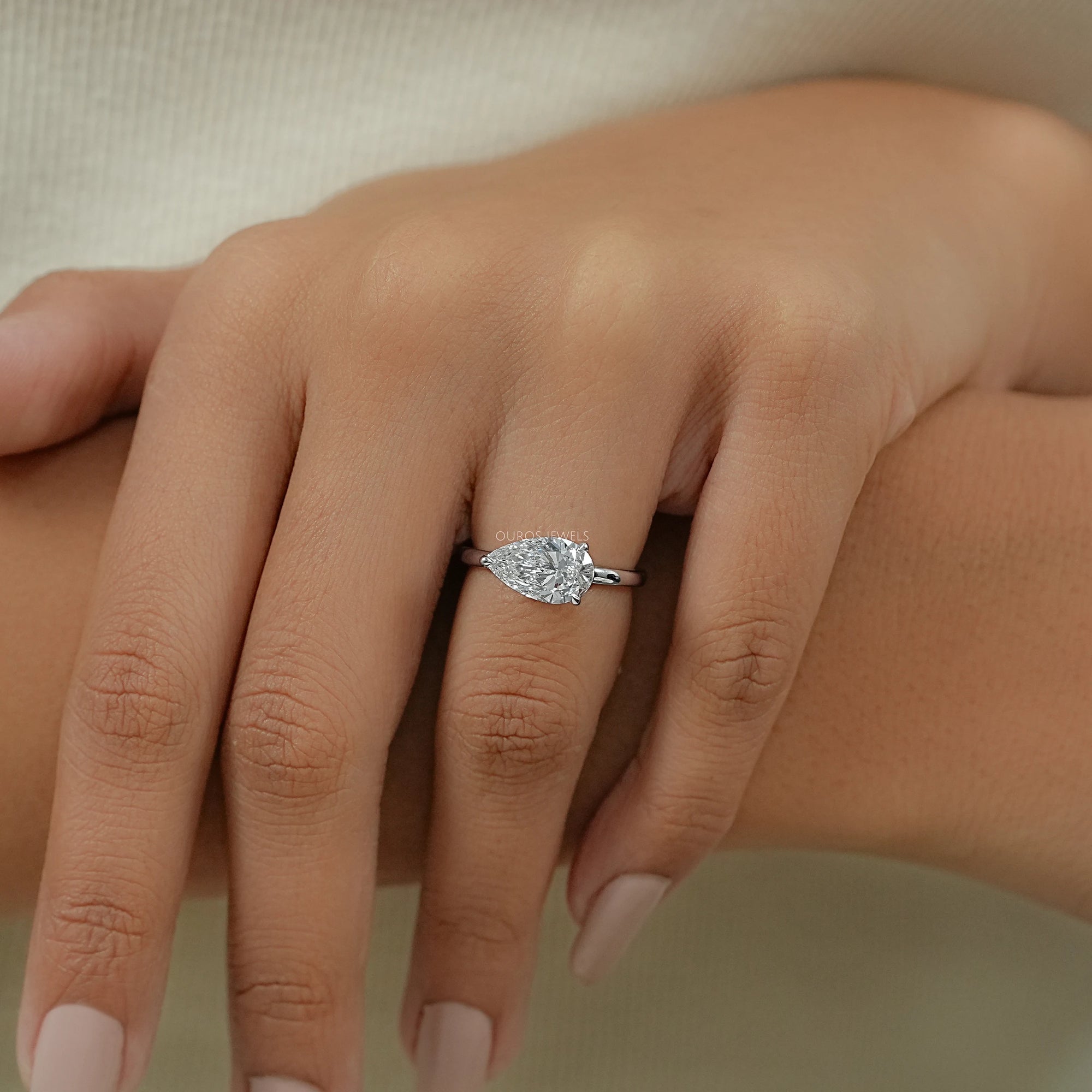 Bezel Set Pear Shaped Diamond Ring