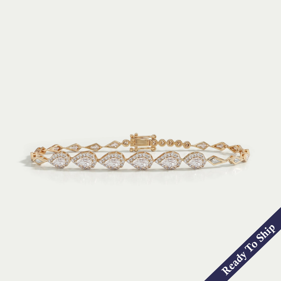 Step Cut Pear Halo Diamond Bracelet