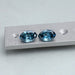 step cut blue oval lab made diamonds pair on matte material