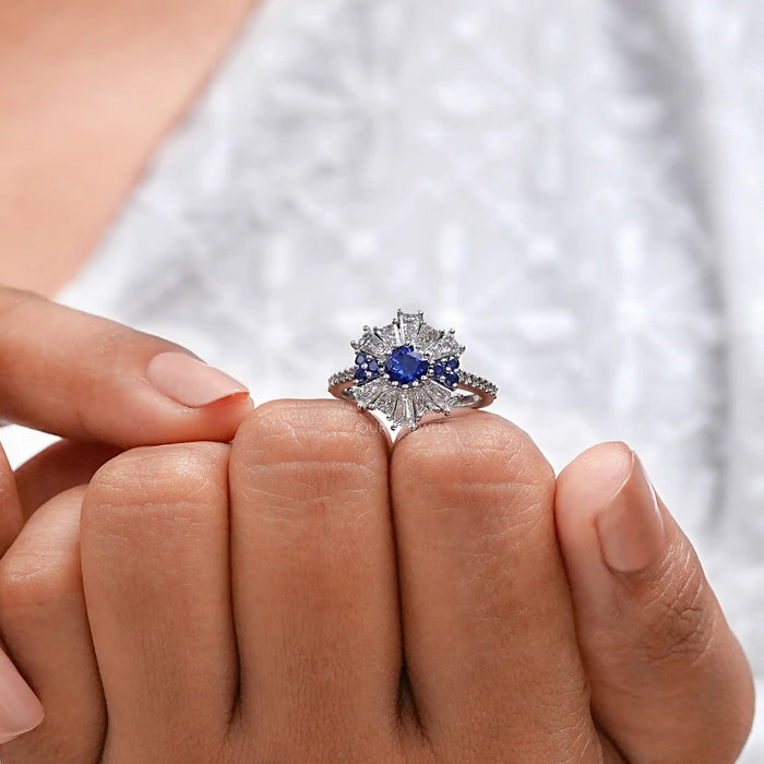 Sapphire Round And Tapered Baguette Diamond Cluster Ring