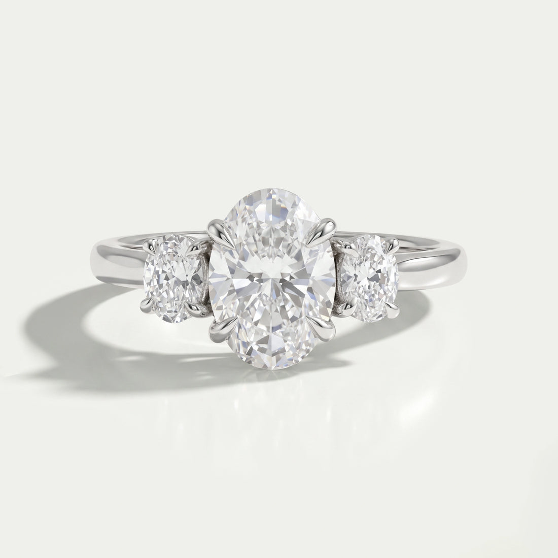 Oval Cut Lab Grown Diamond Three Stone Engagement Ring