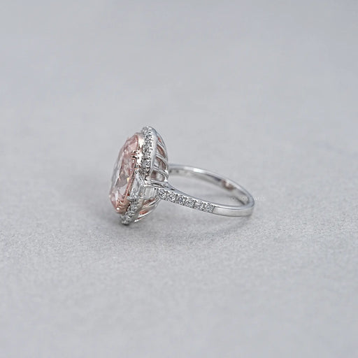side view of pink oval lab diamond with trapezoid halo diamond ring