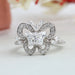 Front view of unique butterfly cut lab diamond cluster engagement ring
