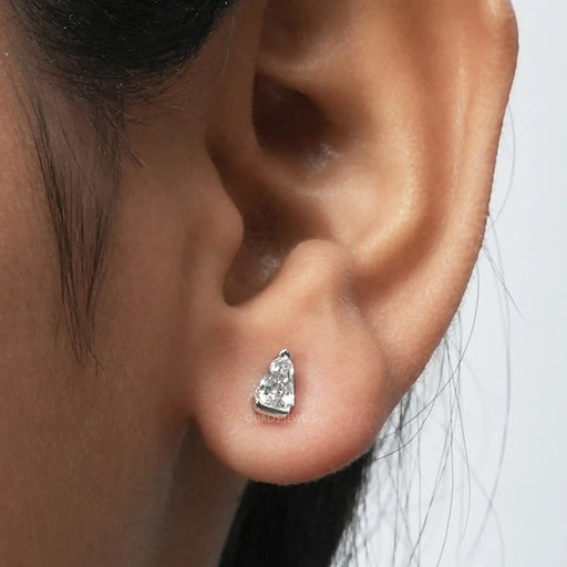 Arrow Cut Stud Diamond Earrings showcased on an ear