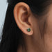 green round shape lab made diamond stud earrings white gold on ear