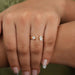 A Women wearing Toi Et Moi Diamond Engagement Ring