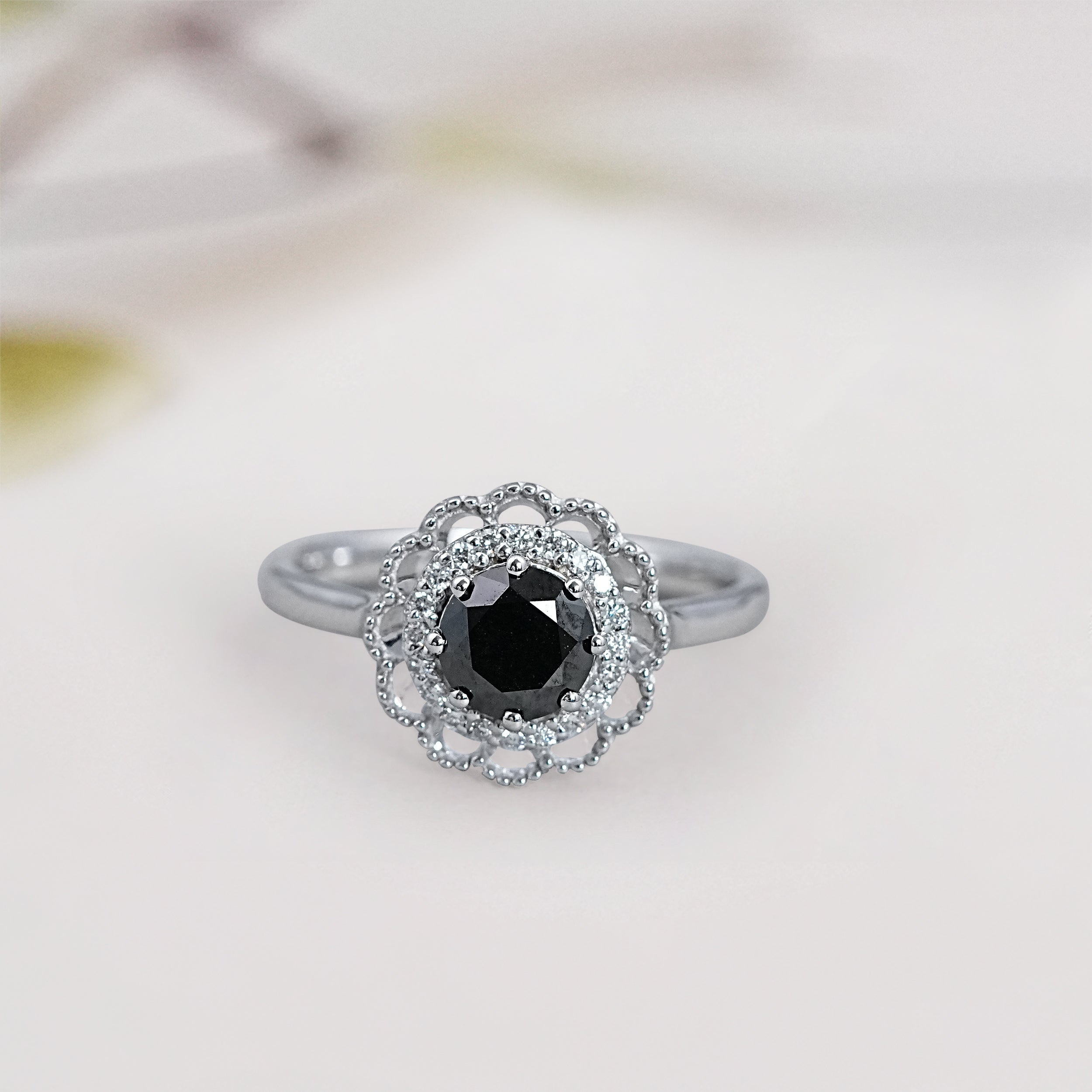 round black floral diamond ring