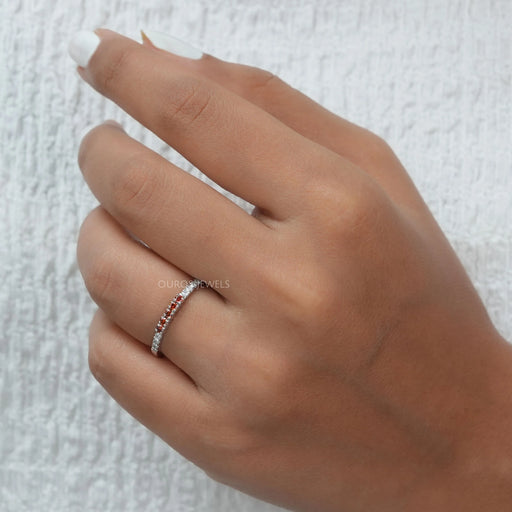 pink round shape lab grown diamond stacking ring white gold on model's finger