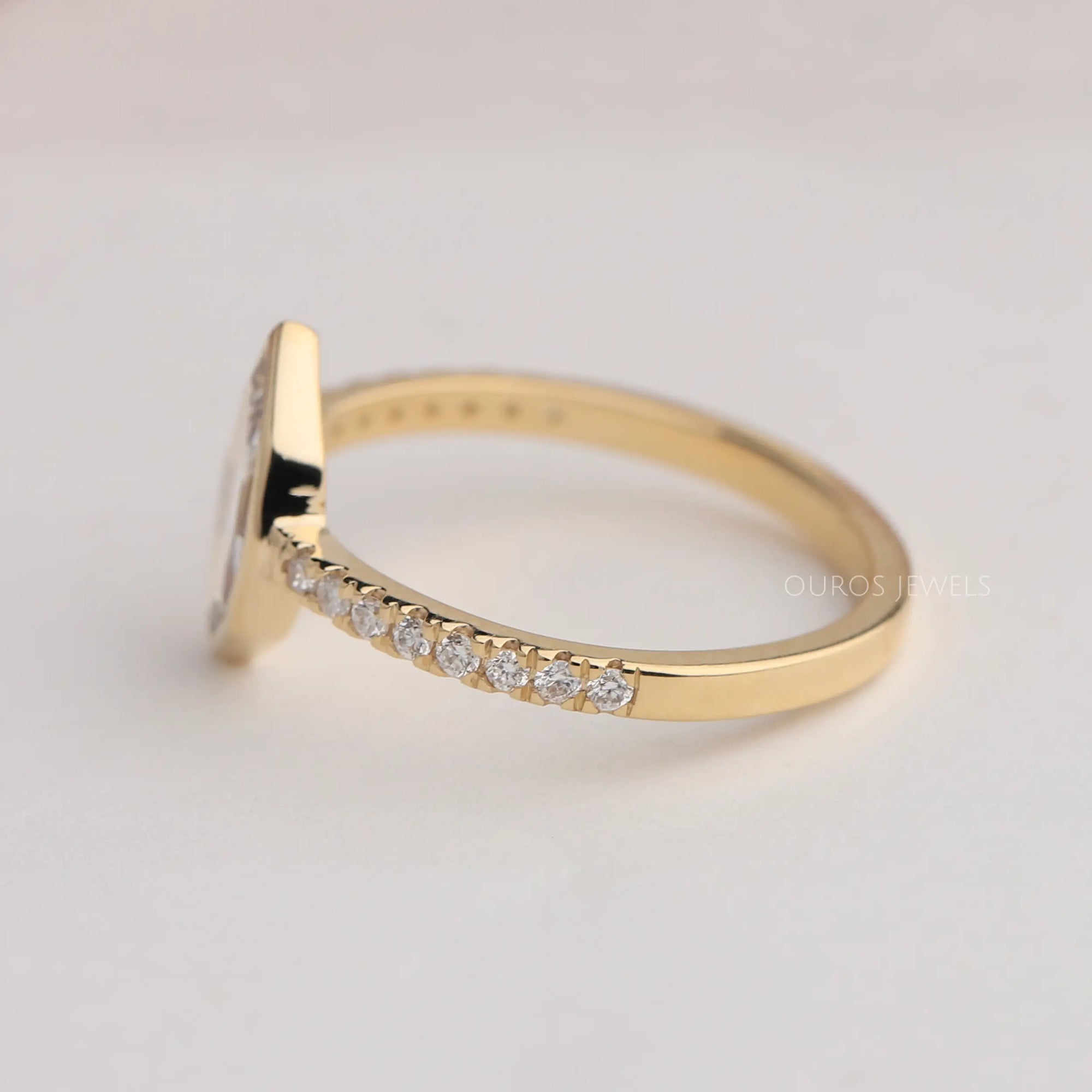 Moval Cut Solitaire Accent Diamond Ring