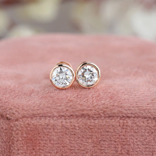 round cut bezel set stud earrings