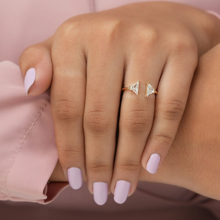 antique trapezoid-cut lab diamond two-stone open cuff wedding band on model's finger