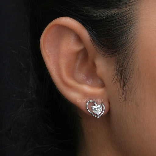 heart diamond earrings surronded with white gold metal