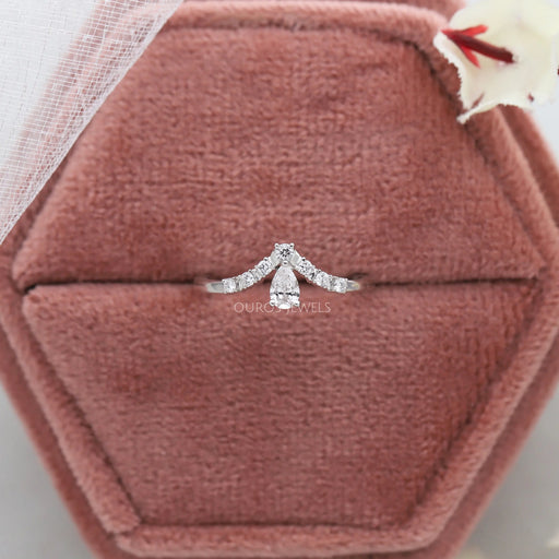 Pear shaped curved diamond wedding band in 14k white gold at Ouros Jewels