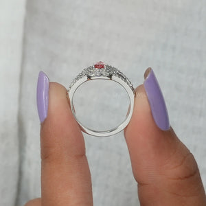 [A Women Holding Pink Pear Halo Engagement Ring]-[Ouros Jewels]